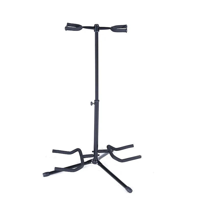 Black vertical double-headed iron guitar stand holding an acoustic guitar upright.
