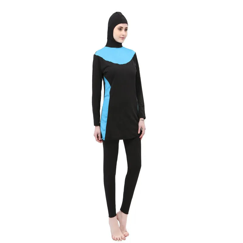 Black women's hooded long sleeve swimsuit with matching pants, shown in conservative one-piece style.