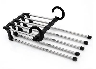 Black 5-in-1 stainless steel trouser hanger with five booms and dual hooks on a clothes rack