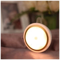 Smart Body Motion Sensor LED night light unit showing compact circular design with 80mm diameter.