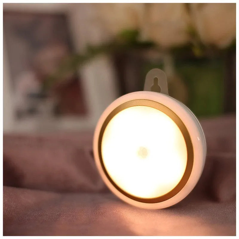 Smart Body Motion Sensor LED night light unit showing compact circular design with 80mm diameter.