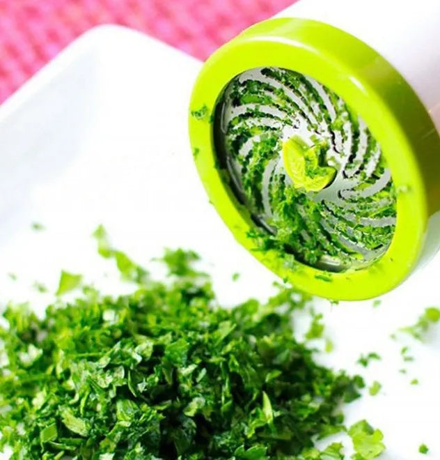 Herb grinder spice mill in white plastic with stainless steel blade and removable top for fresh herbs