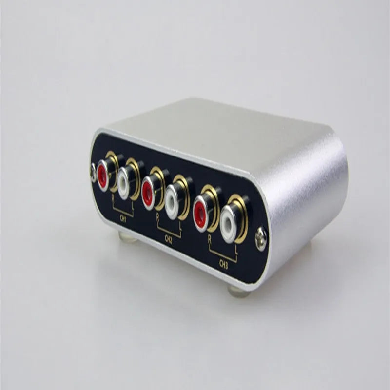 Silver audio source switch with infrared remote control, aluminium alloy shell, front panel buttons and indicator lights, US model