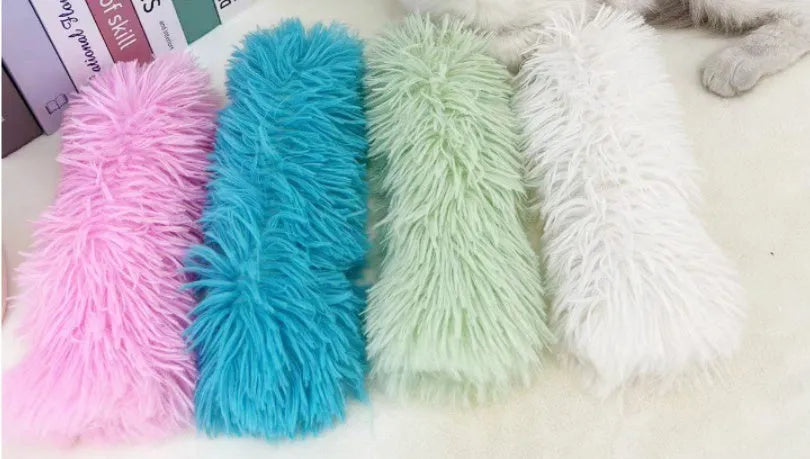 Plush cat toy pillow in four colours: green, white, blue, and pink, measuring 27x10cm