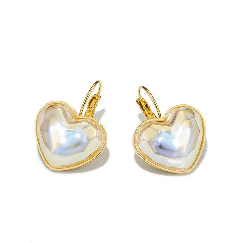 Gold coloured alloy ear clips for women with natural style and ear clip design