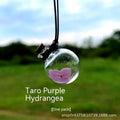 Glass preserved flower car pendant in fire extinguisher shape with pink hydrangea blooms, 28mm diameter