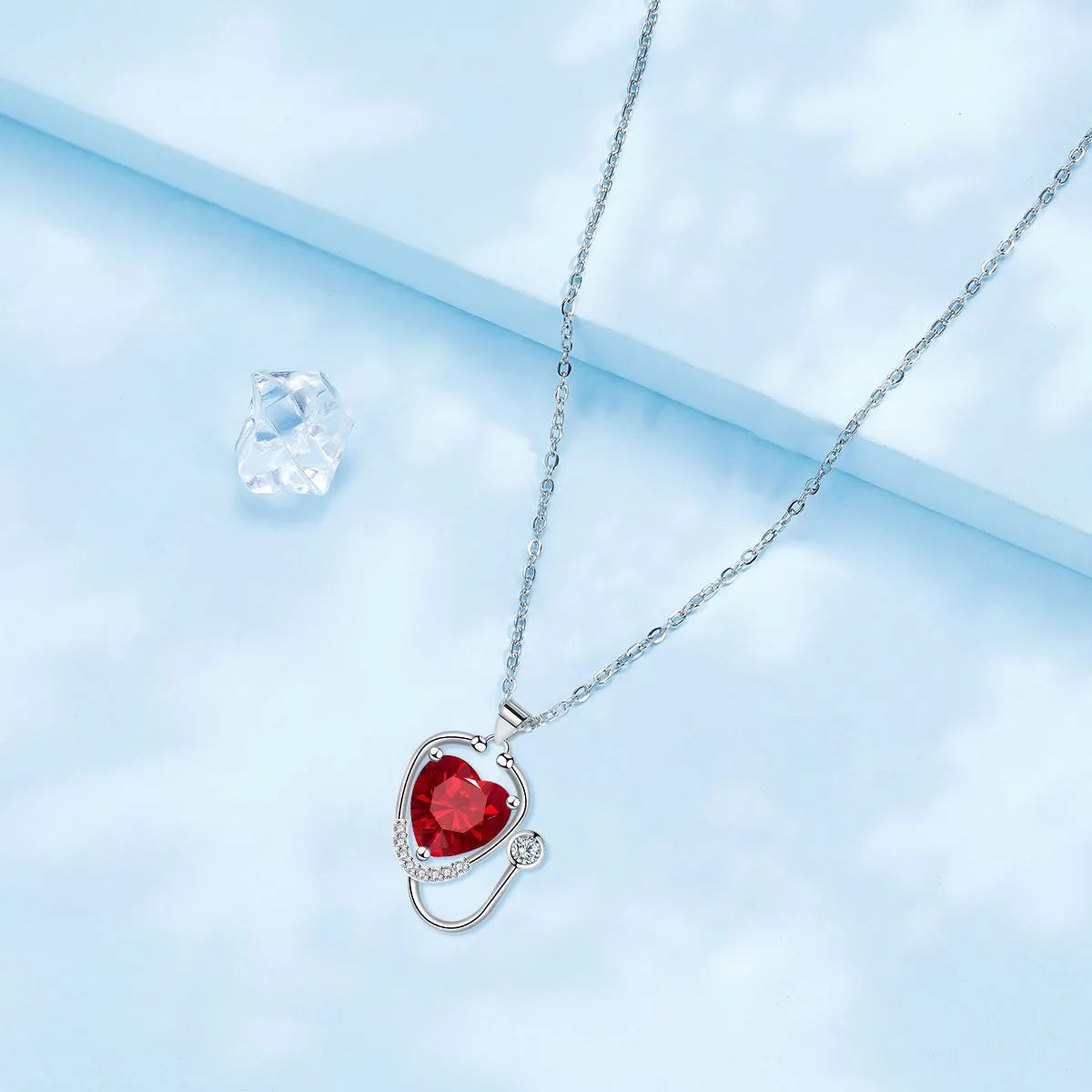 Women's red diamond stethoscope necklace with electroplated copper construction