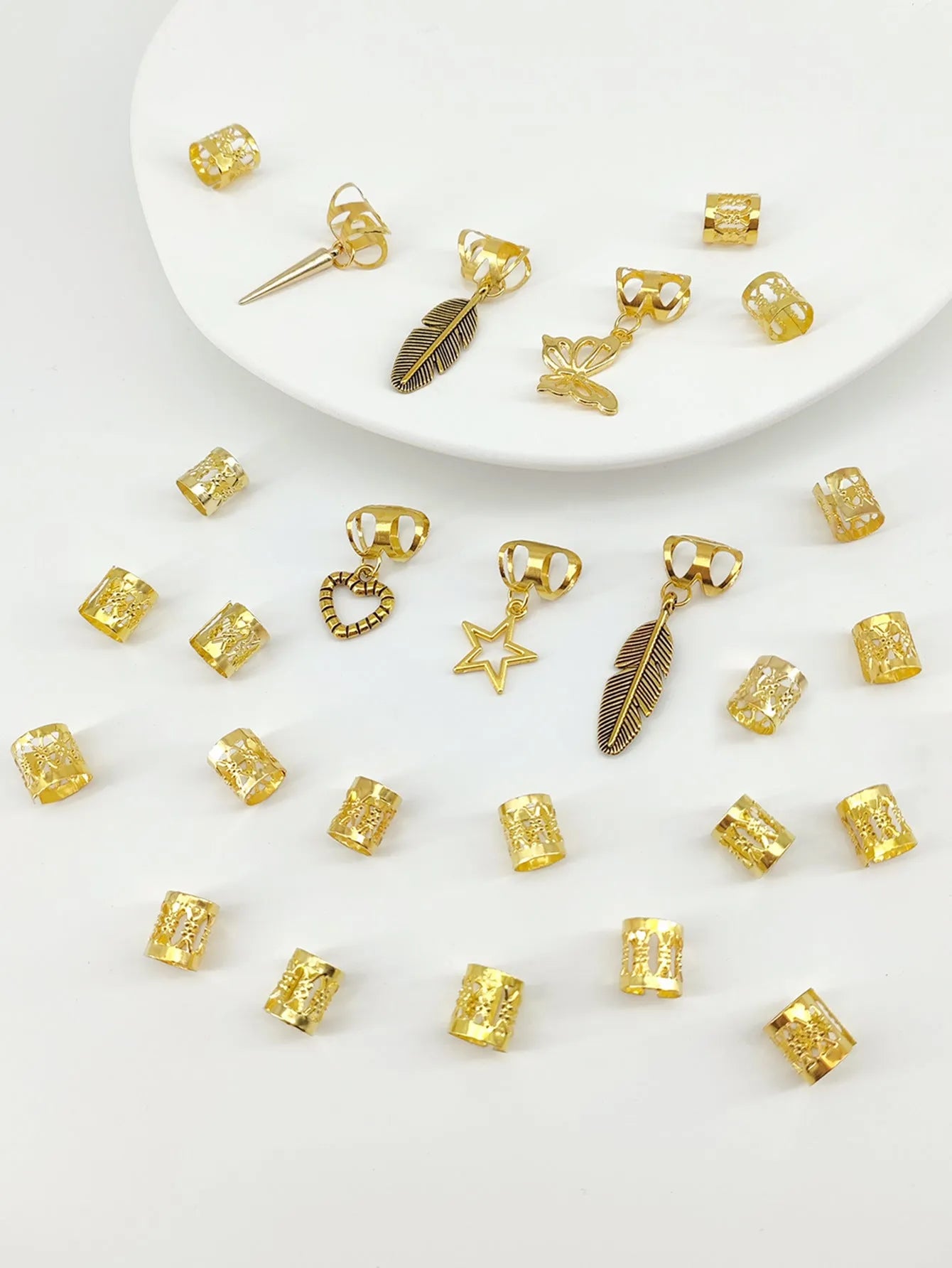 Set of 26 antique-style leaf braid rings in gold and silver alloy with electroplated finish