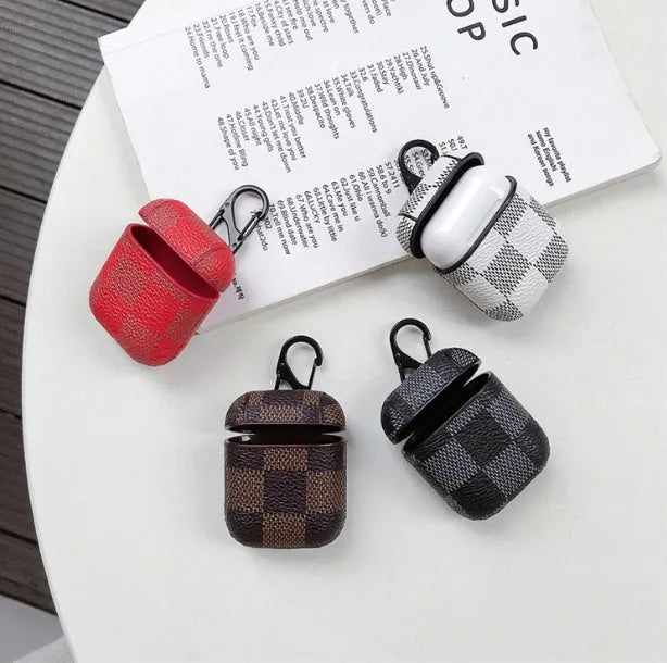 Leather look hard shell phone case for iPhone XS MAX with a hook for AirPods 2 case, shown in a grid pattern.