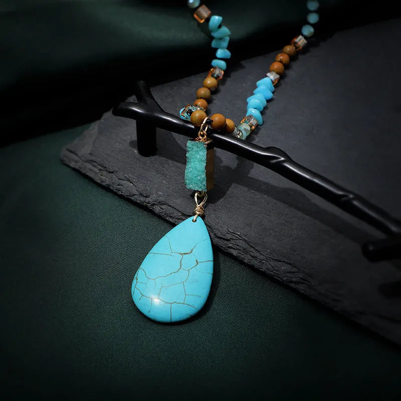 Turquoise blue geometric pendant necklace with ball bead chain measuring 81cm length