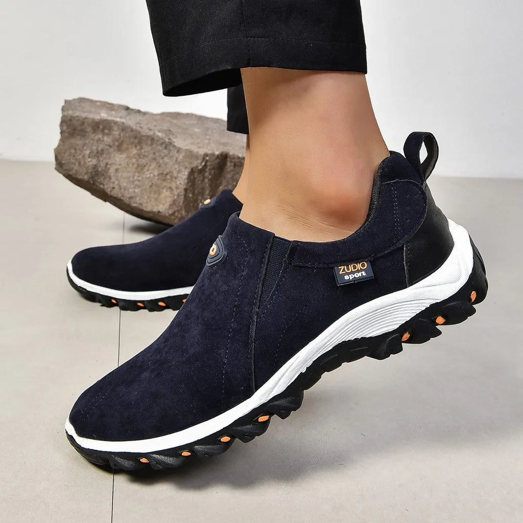 Men's round head thin shoes in five colours showing slip-on design for oversleeve applications