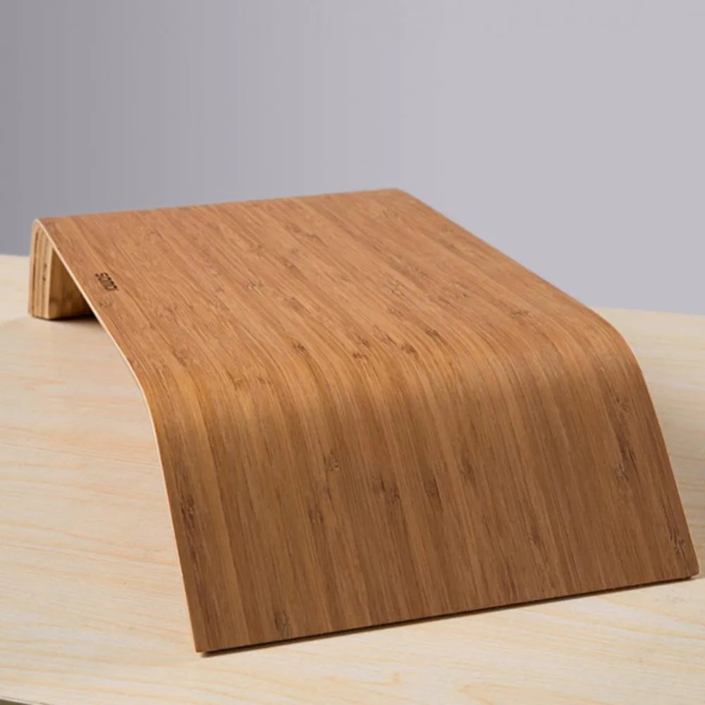 Walnut wood laptop stand with bamboo leather colour finish, 23x51x9cm dimensions, on a desk