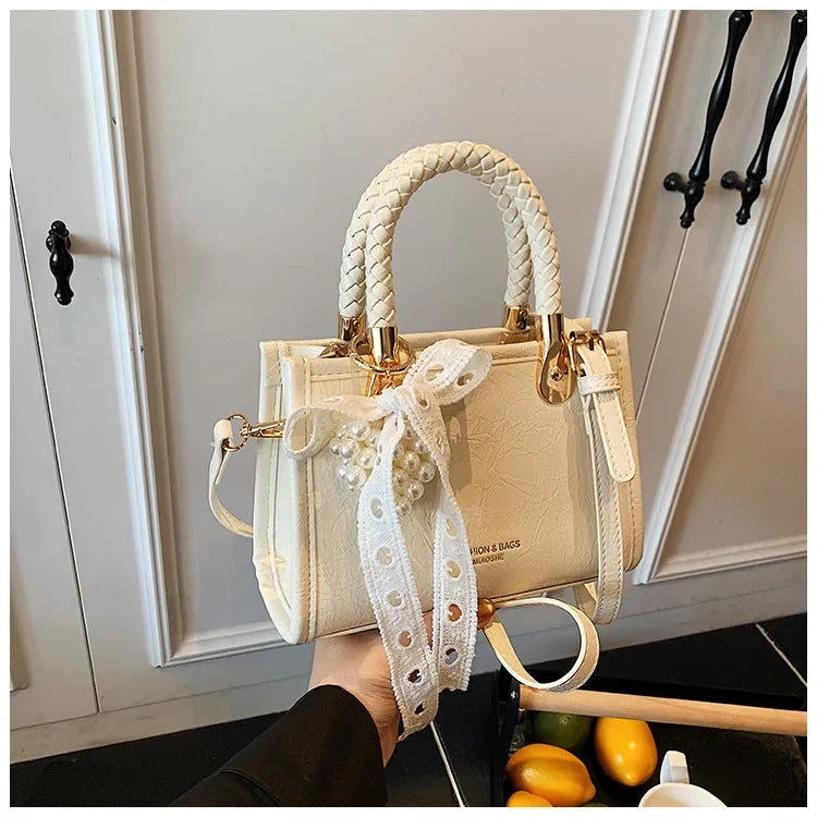 Crossbody small square bag in PU with spliced design, single strap, available in five colours
