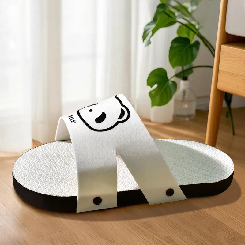 White corrugated paper cat scratch board with slipper-style design on floor