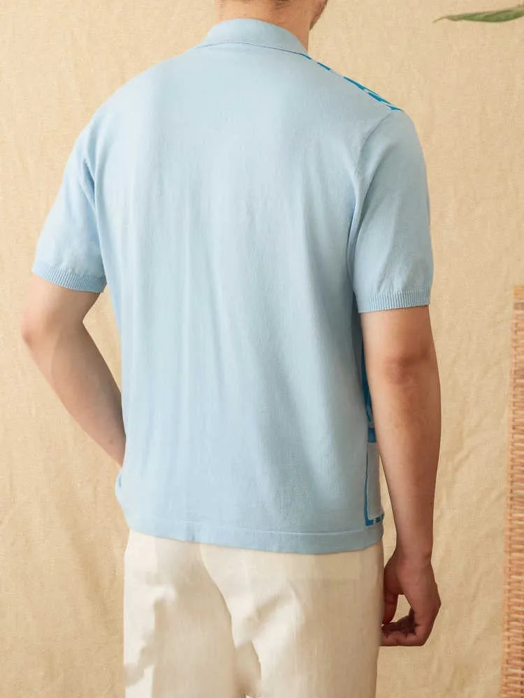 Royal blue striped short-sleeve polo cardigan with a lapel collar on a hanger.