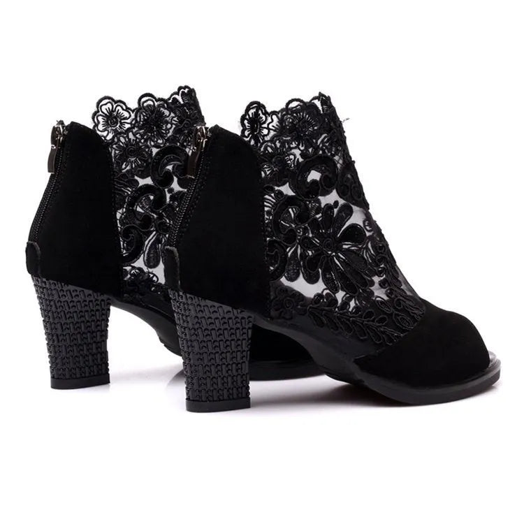 Lucyever women's black lace gladiator sandals with a zip closure and square high heel on a white background.