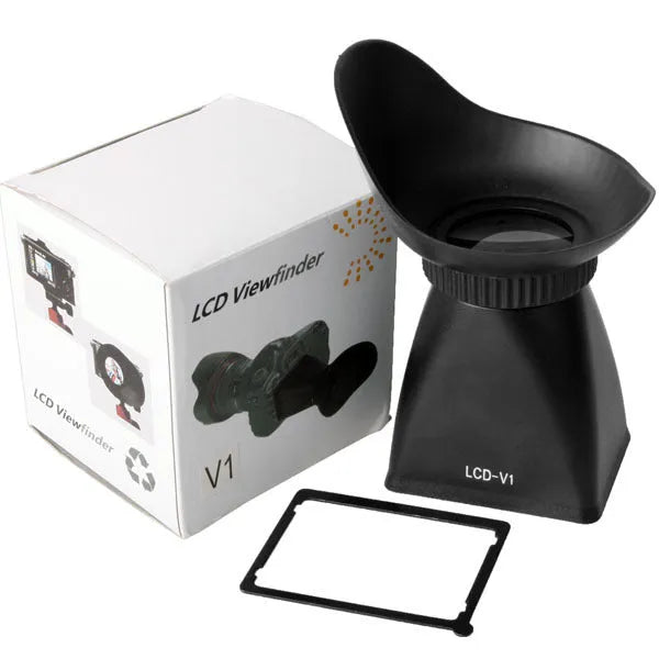 Black camera LCD viewfinder amplifier with magnification lens mounted on DSLR camera