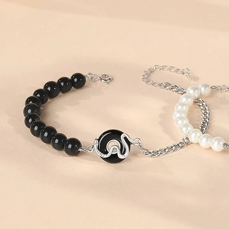 925 Sterling Silver Chinese Obsidian Pearl Couple Bracelet with snake design and safe buckle.