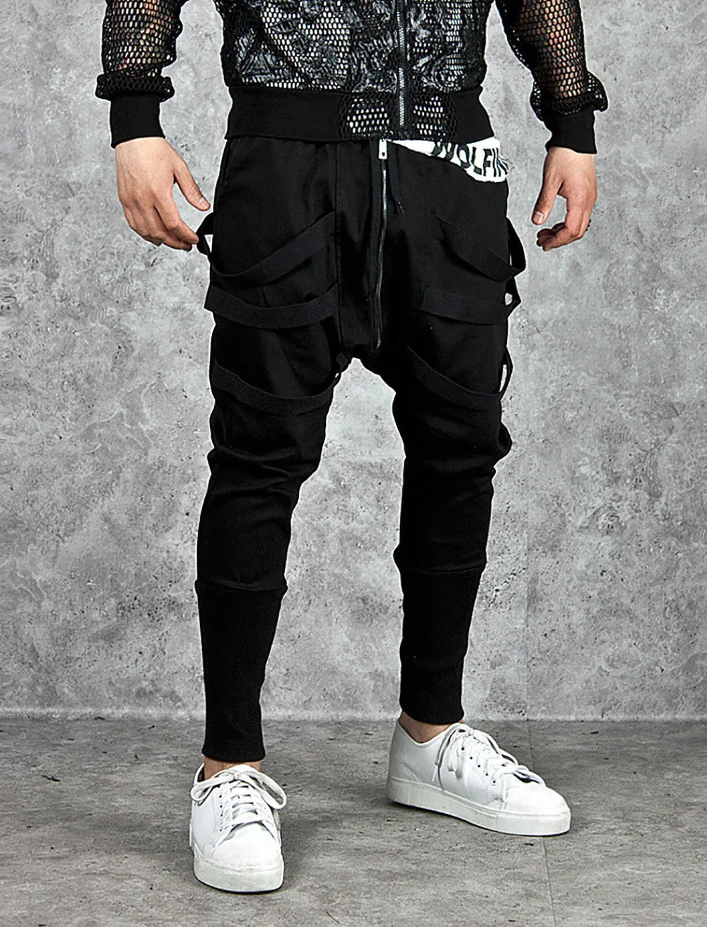 Low crotch cross pants for men in black with tapered leg and small foot opening