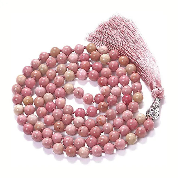 Long agate and amethyst tassel necklace with geometric beads in multiple colours on a 95-100cm chain.