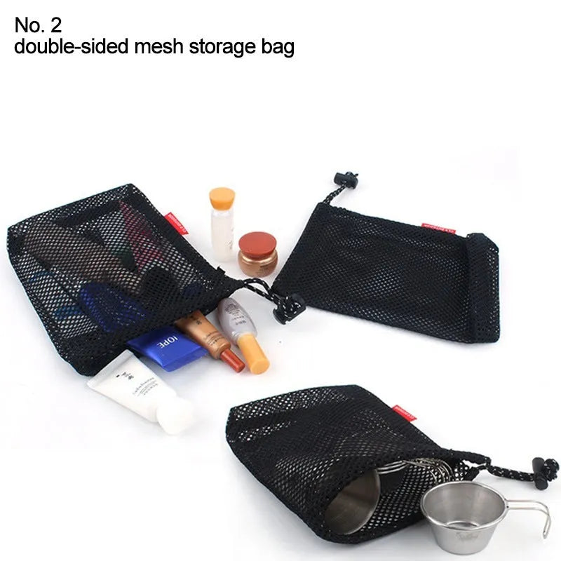 Five red outdoor storage bags with mesh panels and zipper closures for travel organisation