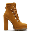 Women's suede high heel boots with round toe, thick heel, waterproof platform, and buckle detail.