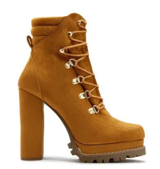Women's suede high heel boots with round toe, thick heel, waterproof platform, and buckle detail.