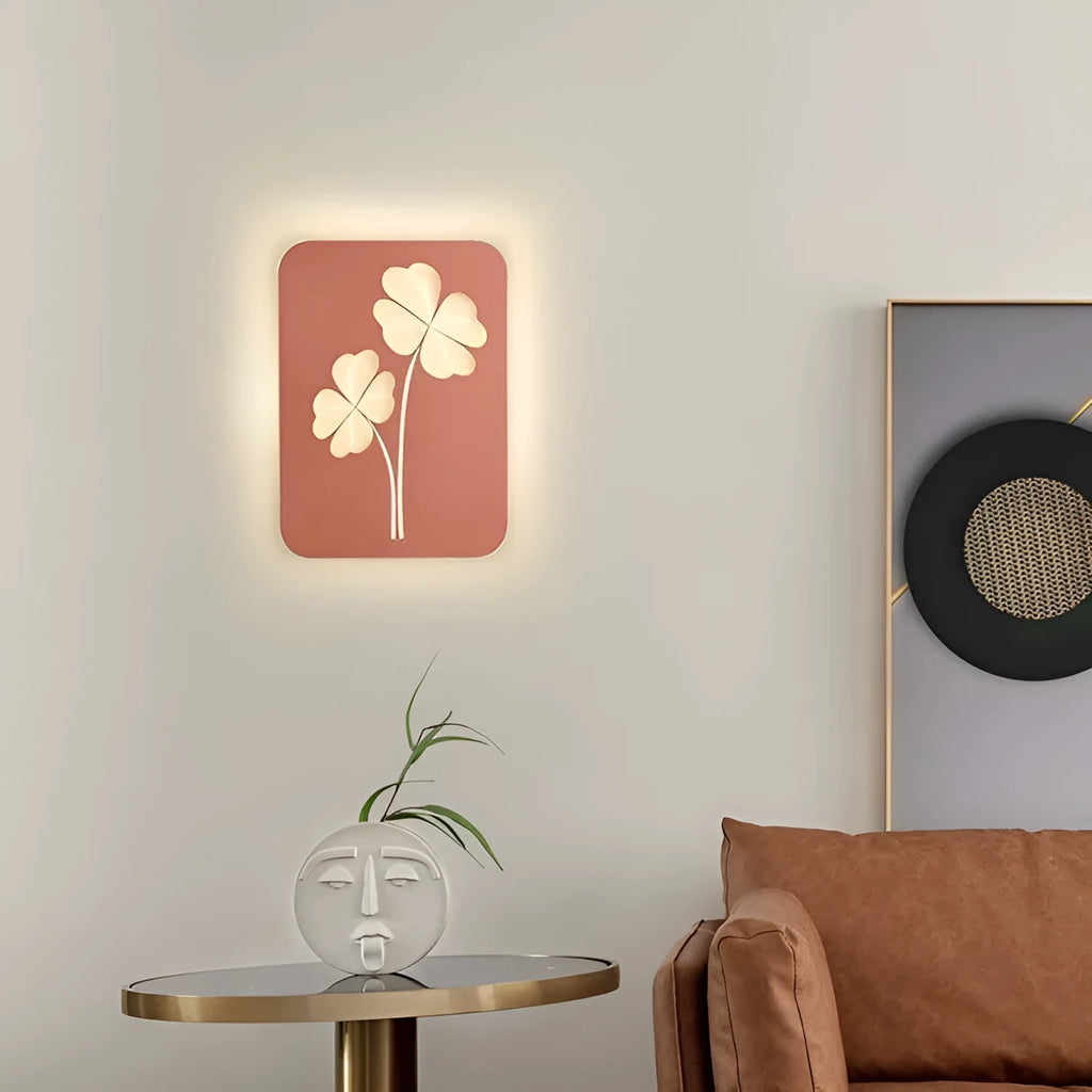 Modern wall lamp with decorative acrylic shade showing love heart design in pink colour option