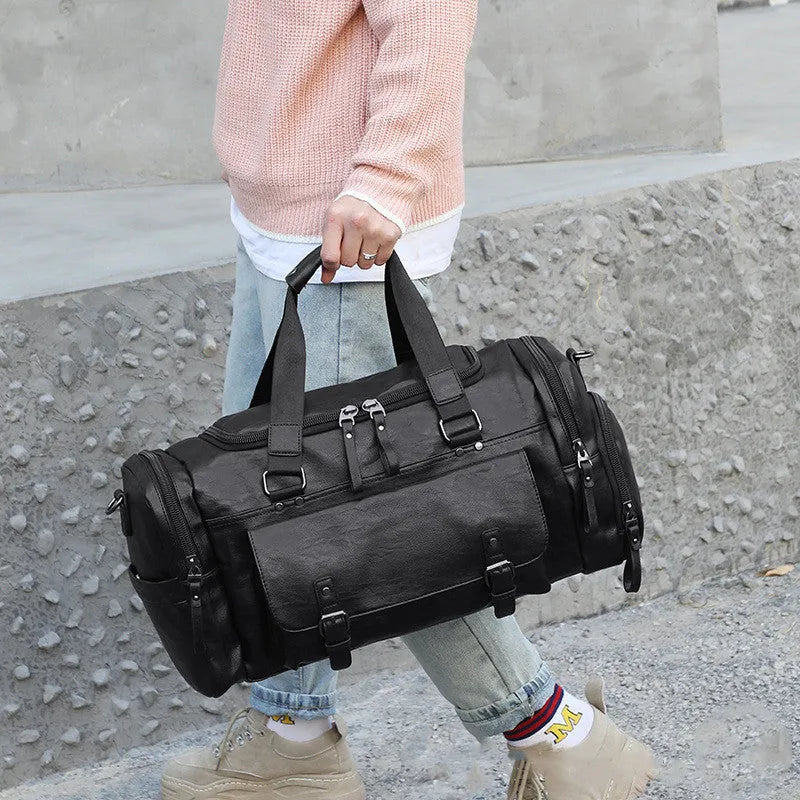 Black PU travel bag with separate shoe compartment showing dimensions of 52cm length
