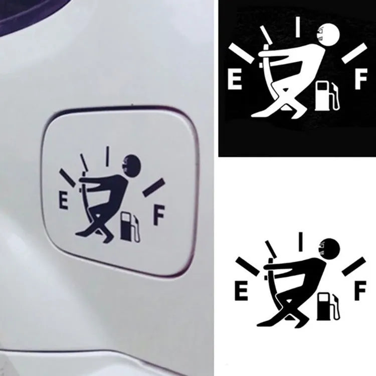 Reflective insufficient fuel car sticker 12.7cm x 9cm in black on a car dashboard