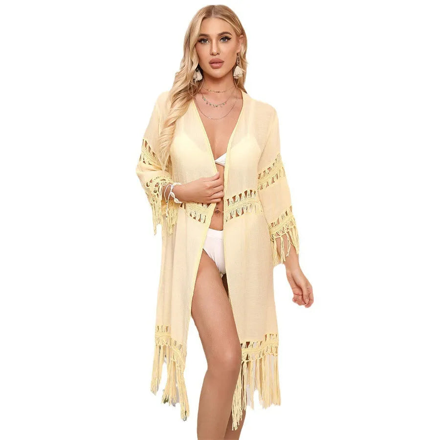 Hand-crocheted women's beach cover-up cardigan with tassel detailing in water green colour