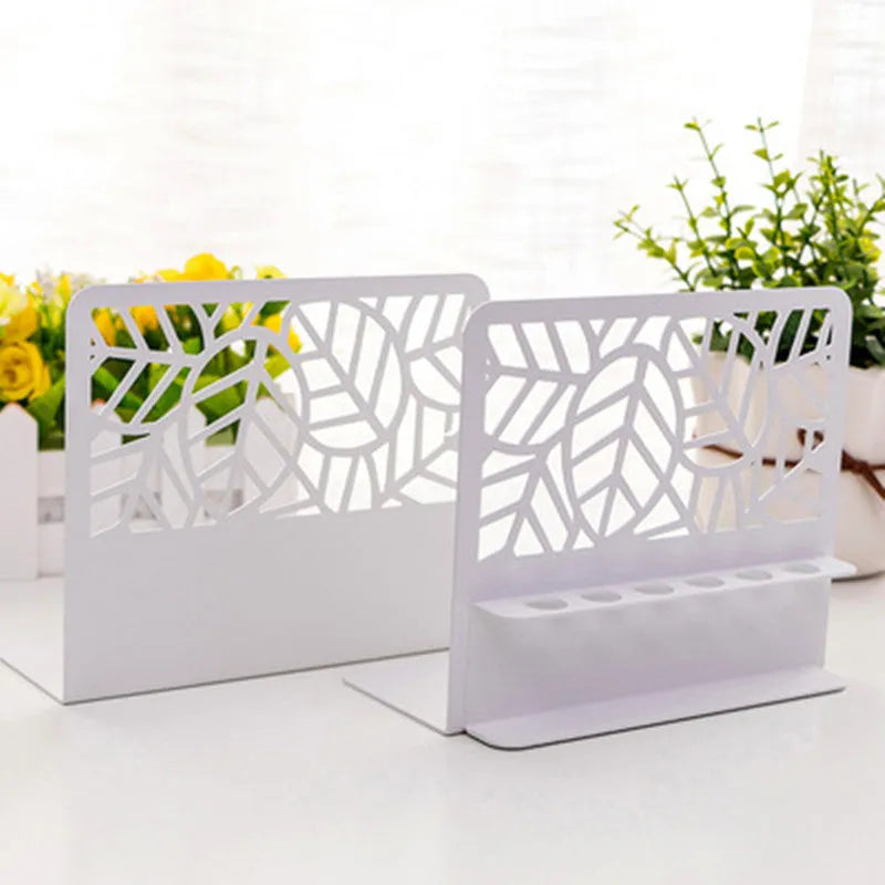 Pair of white steel Nordic bookends with six-hole pen holder and Japanese hollow design on a wooden desk