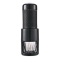 Portable manual espresso coffee machine in black, 7x7x20.3 cm, with hand-pressure lever and stainless steel build