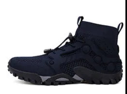 Outdoor climbing boots with Flyknit upper and natural rubber sole, available in multiple colours and sizes
