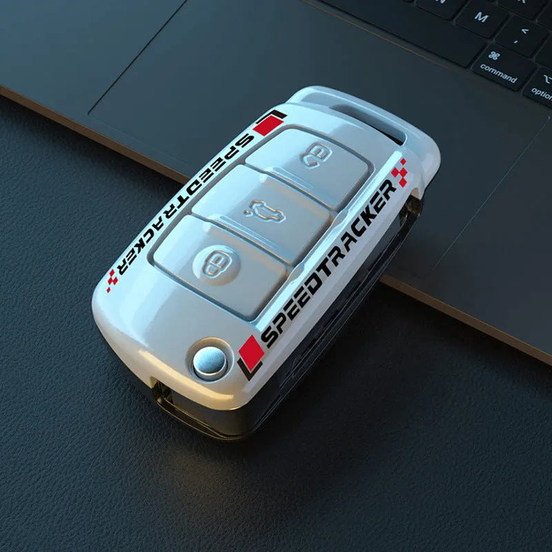 Carbon fibre style car key cover with mirror finish in carbon and white colour options