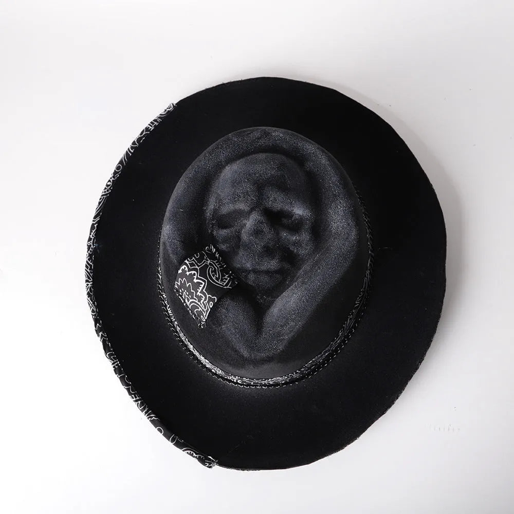 Handmade wool felt skull hat with conical crown showing Halloween design