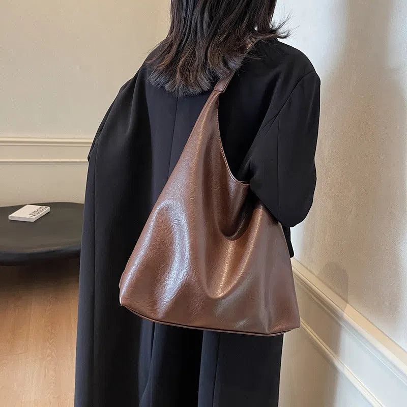 Women's soft PU single shoulder bucket bag in Coffee, Black, Brown, or Mud colour with phone pocket