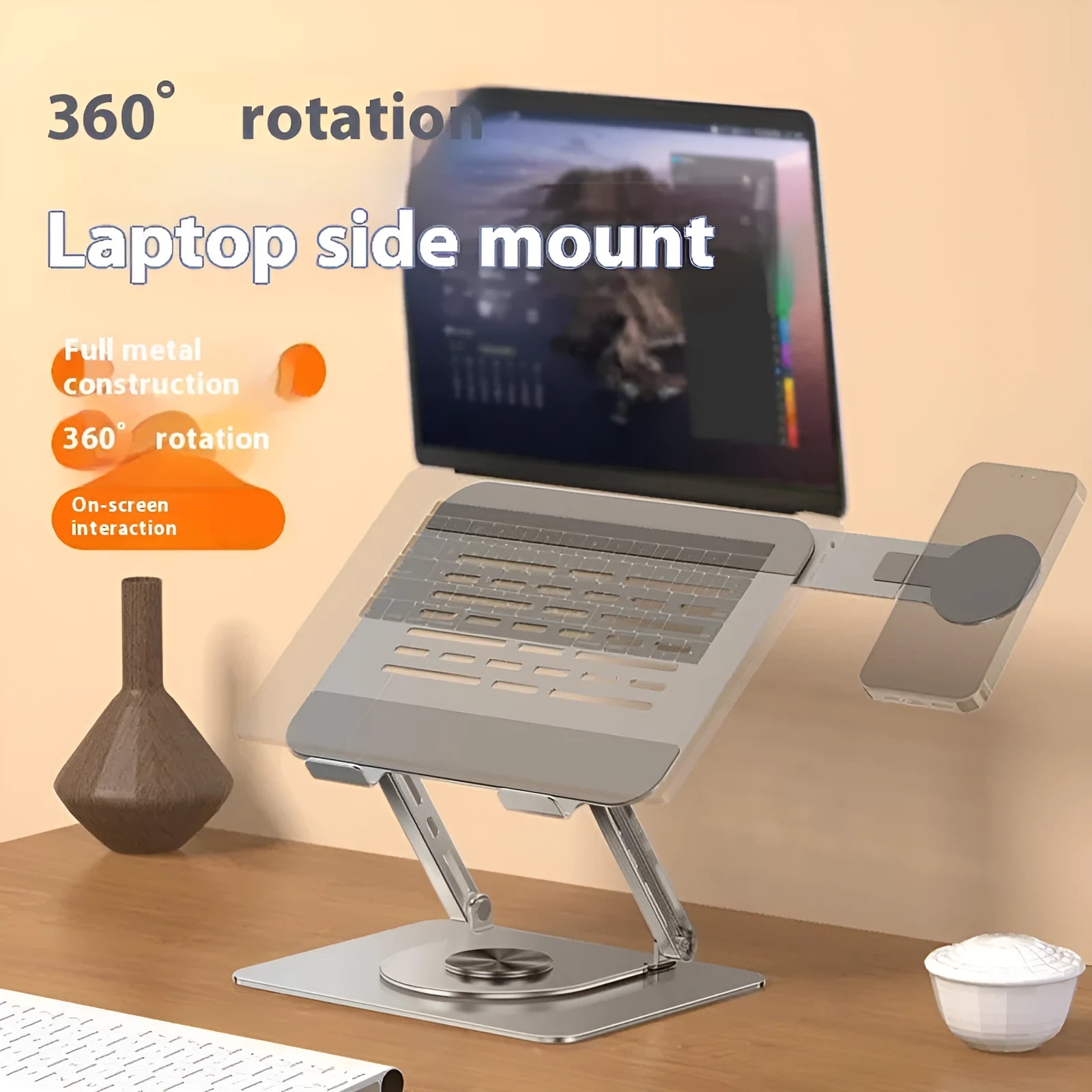 Silver carbon steel laptop stand with rotating magnetic phone holder supporting 17-inch laptop