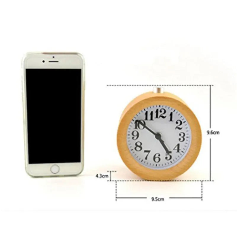 Solid beech wood silent snooze alarm clock showing wooden case and white dial.