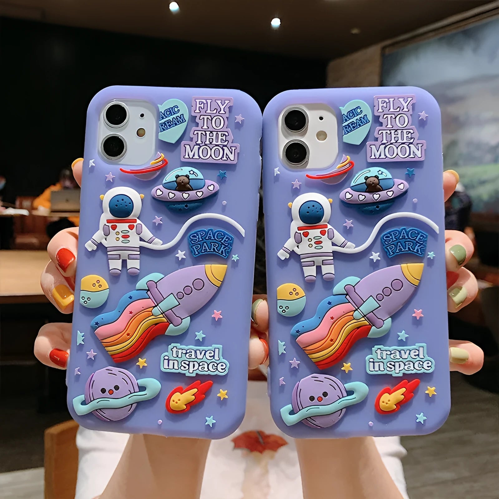 Purple silicone gel mobile phone case with spaceman astronaut cartoon design for iPhone