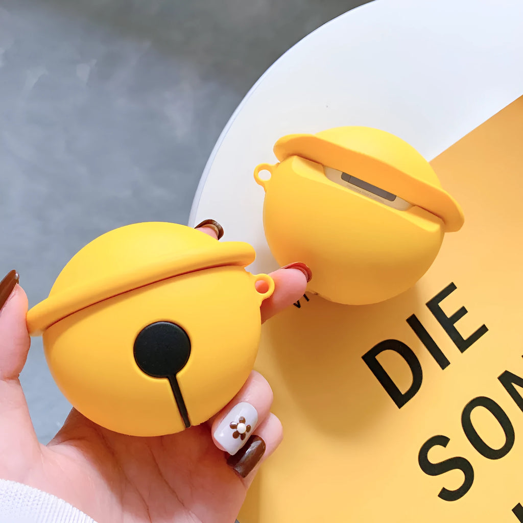 Bright yellow silicone case with a bell charm for Apple AirPods 1 and 2 generation.