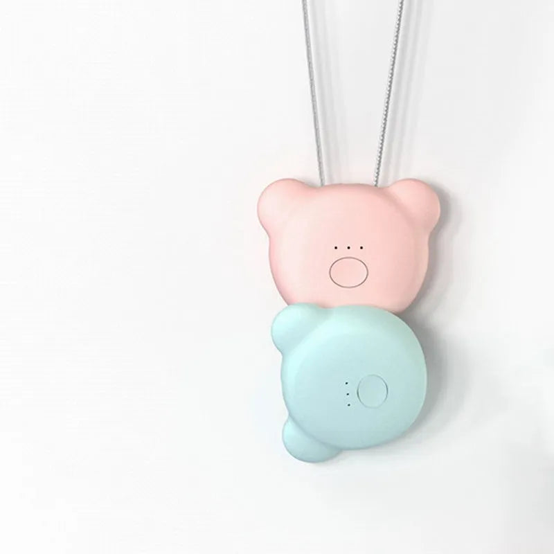 Mini USB portable air purifier necklace in blue colour, showing wearable design and single button.