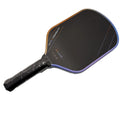 Matte black pickleball racket with Teflon cloth pattern, showing carbon fibre construction and honeycomb core.