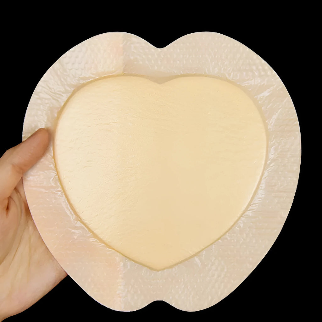 Large skin-colour silicone bedsore dressing for pressure sore prevention