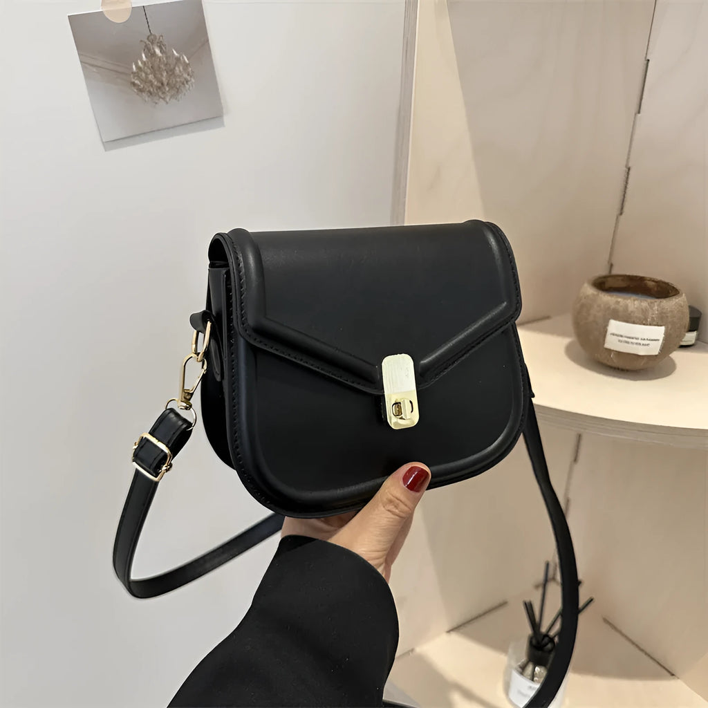 Soft black PU leather clamshell shoulder messenger bag shown open, featuring a horizontal square shape.