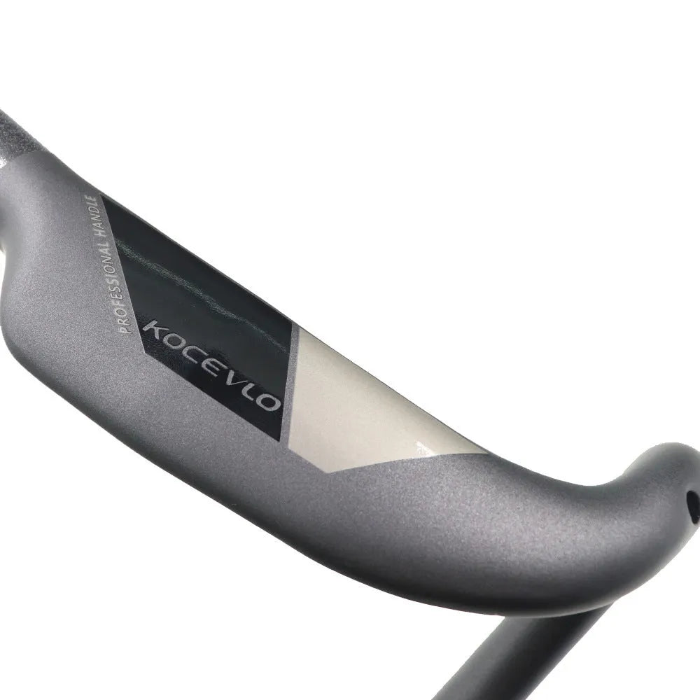 Wei Bike matt carbon fibre road bike drop handlebar, bent shape, black finish, on white background
