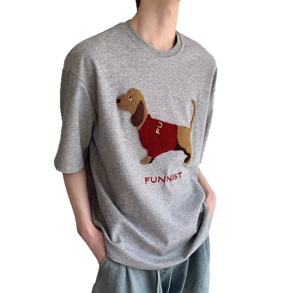 Grey men's cotton t-shirt with embroidered dachshund dog holding a towel graphic.