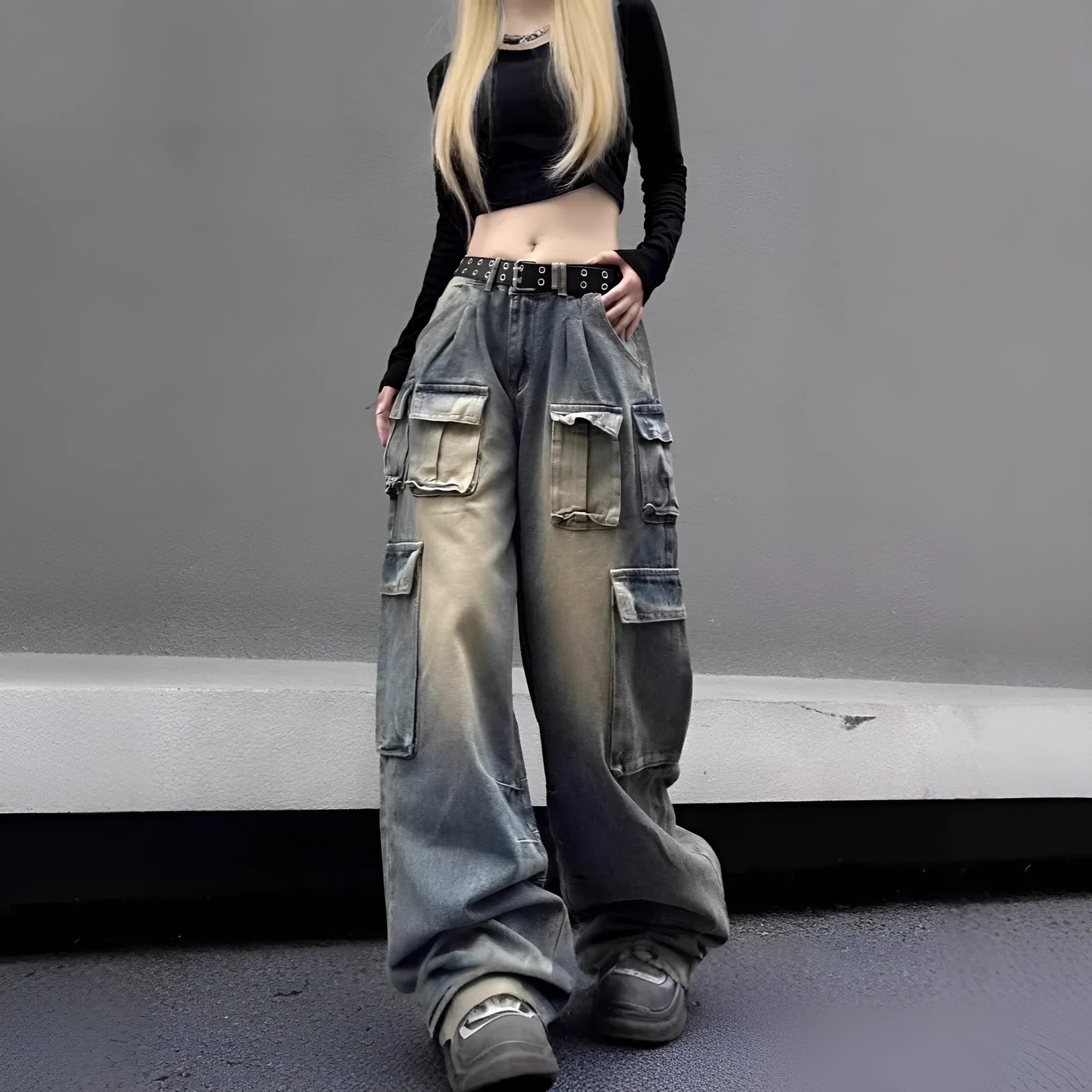 Loose fit multi-pocket distressed denim jeans in light blue wash straight-leg street style