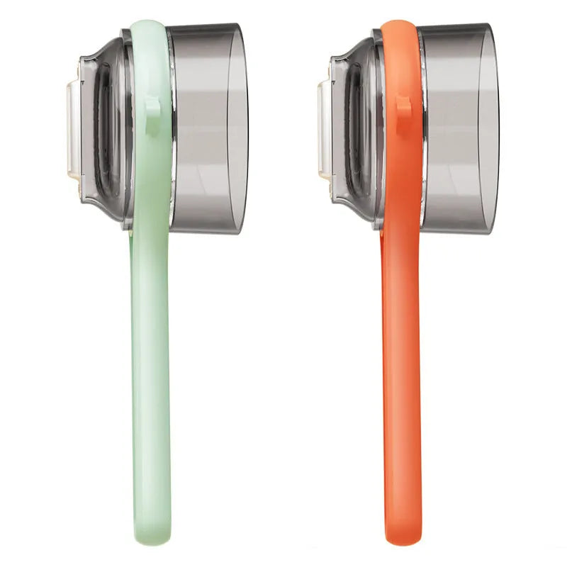 Kitchen multi-functional peeler with bucket storage in light green and orange colours, food-grade plastic construction