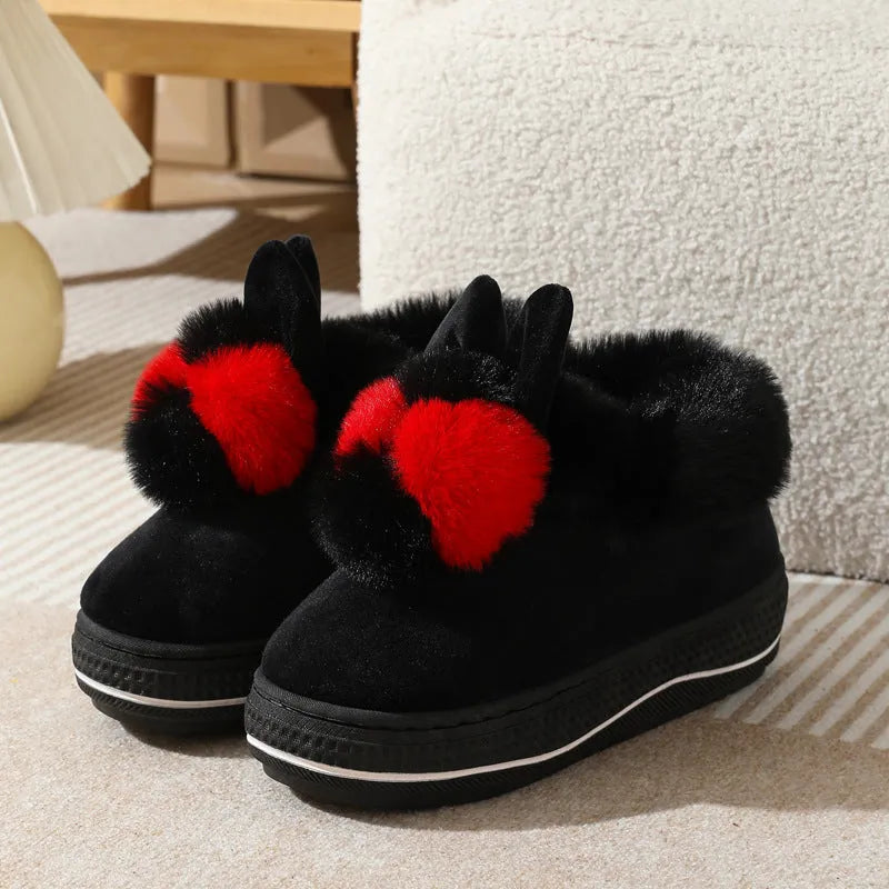 Winter high heel slippers with plush upper and thick TPR sole in gray colour on a floor